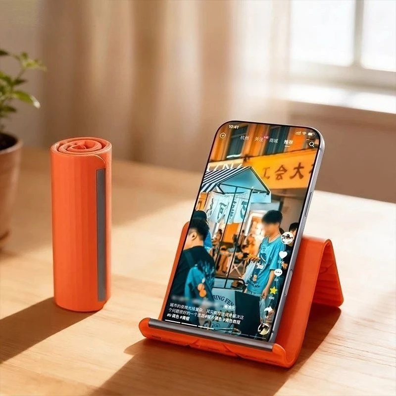 Standing Desk - クリエイティブで柔軟性があり、折りたたみ式で変形可能なスタンド。怠惰な姿勢でも使える、旅行やオフィスでの使用に最適な、持ち運び可能なシリコン製のデスクトップ用スマートフォン・タブレットホルダー。